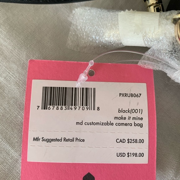 Brand new with tags untouched Kate Spade bag. - Picture 2 of 5